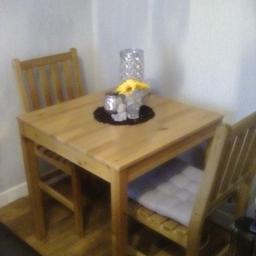 Small table and two chairs 70x70cm table top height is 74cm in good condition can deliver locally