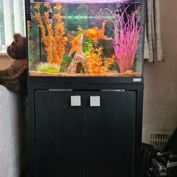 100L fish tank and cabinet. Complete set up. Comes with everything in pictures, including fish and new heat pump. Plus may have other bits when I find them. Only selling as no longer appreciate like we should and used to. Great set up. 
Located in West Keal, near Spilsby. Lincolnshire.