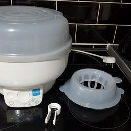 Used but in good condition clean and fully working. no manual or box and no bottles included. steriliser can be used on the stand or in microwave. food and bottles can be warmed and defrost mode for Brest milk and frozen food pouches.. slight crack on lid where you lift it off but doesn't effect it working at all.