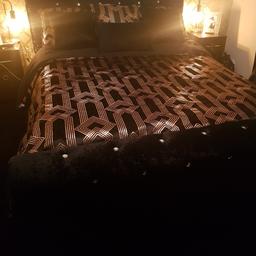 king size black crushed velvet bed with diamante studs .. clean excellent condition only selling due a a change in colour scheme