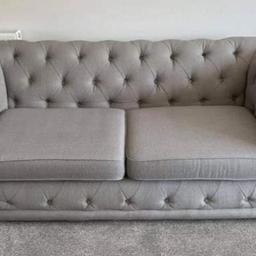 Lovely Chesterfield style grey fabric sofa and matching chair.

Good condition washable cushion covers. Can deliver locally. New sofa coming so need it gone.

Measurements are as follows:

Sofa:- Length 215cm Depth 101cm Height 71cm

Chair:- Length 115cm Depth 101cm Height 71cm

£400 or near offer can deliver locally