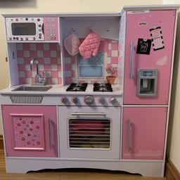 KidKraft wooden kitchen. Size 104 x 103 x 32cm (HxLxW). Good condition with one small mark and some stickers which will come off. Can add some kitchen toys for full price. Collection only or will deliver locally for a charge. No offers