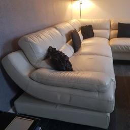 leather corner sofa with footstool.. very comfortable .. cream/off white good clean condition odd scuff mark which I have tried to show in pics just want to be honest in description collection from L36 huyton can deliver only if local