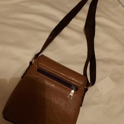 crossbody bag, original brown leather from Israel. Has 'Jerusalem' printed on the front of the bag. Bargain price!
