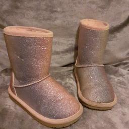 Rainbow glitter ugg style boots. Fur lined very sparkly boots. Rubber sole so non slip in rain. Great condition. Collection only