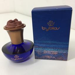Byblos by Byblos Eau de Perfume for woman 50ml.; cobalt blue bottle. Used only few sprays to try, otherwise new. With box. Along with it I will send a empty miniature bottle of same perfume wich you can refill. Dispatched with Royal Mail 2nd Class.