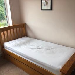 marks and spencer’s single pine bed. cost £250, excellent condition with large under storage. MATTRESS NO INCLUDED.