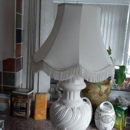Heavy  White Lamp with matching  White shade .Beautiful  Lamp for any Room  or Hallway. selling  due to colour decoration. Can be seen  working on pic 4.Buyer must collect. make an ideal xmas gift. Bargain.