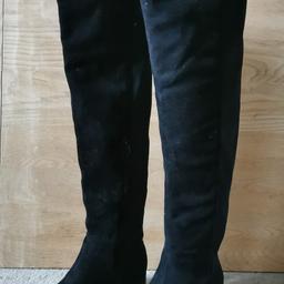 Black boots with half zip and stretch back panel. Worn a handful of times