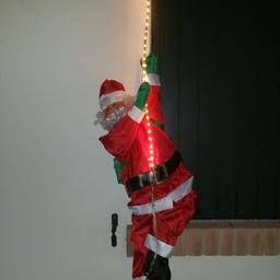 Babbo Natale su tubo luminoso