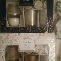 New candle glitter sets .Glass candle.2 tealight holders and 3 glitter tealights.Perfect stocking fillers.Pick up only.Both for 6 pounds