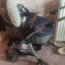 Girls silver cross pram with matching bag and a parasol also. it does have a slight bend in the handle as pictured possibly be straightened back up but dosn't affect use.