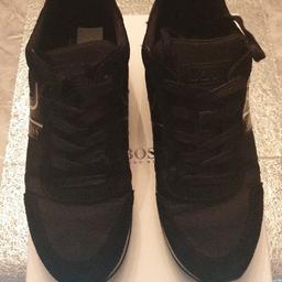 genuine black Hugo boss size 5 trainers still in box
Worn once and in excellent condition.
