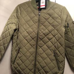 Brand new with tags a medium size khaki green padded jacket