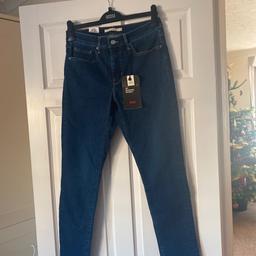 Tags on, ladies 311 Shaping Skinny Levi jeans
Size 30 x 30

A gift that sadly doesn’t fit- boyfriend paid £80 for these.