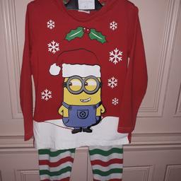 BRIGHTLY COLOURED WITH CHRISTMAS MINION AND STRIPED BOTTOMS WILL SUITE ANY CHILD FOR CHRISTMAS.