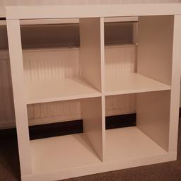 4 cube Ikea unit. The original before they changed to Kallax. No storage boxes with it. Very sturdy does have a few scratches on it, have tried to show one in the second picture.