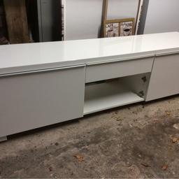 White high gloss tv unit, large and heavy, Buyer to collect. Middle panel missing, Need gone ASAP.