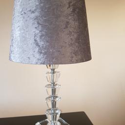 Like new silver/grey bedside table lamp, with clear mirrored effect base. No damages at all. Collection only due to fear of breakage.