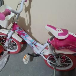 girls barbie bike 
fab condition only been used once for 5 mins outside. 
helmet brand new with tags 
has basket and dolly seat. 
£50 collection leeds ls8 only.