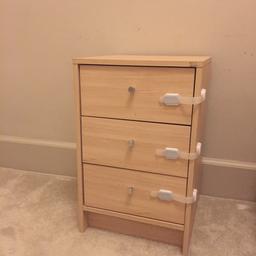 Bedside table with three drawers. Middle draw door has come loose but can be fixed. In good condition otherwise. Giving away for free