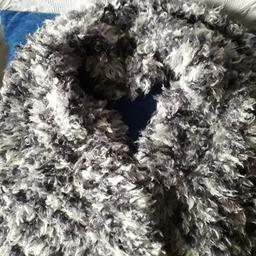 GREY AND WHITE THICK AND CHUNKY REALY WARM. BOTH ARE 47" IN LENGHT . ONE IS 8" WIDE..THE OTHER 10" WIDE. £8 EACH