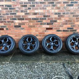 Like new 5 stud. Ford ST BLACK ALLOYS AN tyres. 

Wheels have been balanced. Tyres like new. 
Fit many models.

215/55ZR16

Can deliver local for small fee.