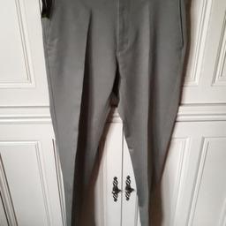 M&S SIZE 34"WAIST 33,"LEG WITH STRECH. CLIMATE CONTROL TECHNOLOGY. REGULATES YOUR TEMPERATURE KEEPING COOL ON WARM DAYS AND HELPING YOU KEEP WARM AS IT GETS COLDER.  RETAINS ITS SHAPE GREAT FOR TRAVELLING.