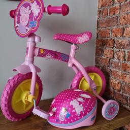 10 inch balance bike with stabilisers and peppa pig helmet both excellent condition as new collection only