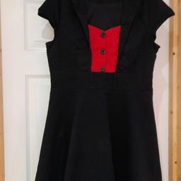 It is very fitted at the bust with an invisible side zip and label says XXXL, but fits more like size 14 to 16.

Grab this bargain in time for Christmas or New Year's.