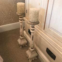 Pair of wooden large standing cream and gold wooden candlestick with ornate carved candles which have never been lit. 
From smoke and pet free home