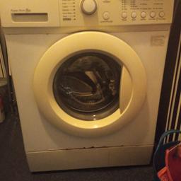 I'm selling a washing machine it holds 8kg of washing some scratches here and there but works fine.