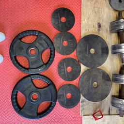 All weights have a 2” hole for barbell 
Selling barbell separate if you want both I can do a deal
20kg - 2 of (rubber)
10kg - 2 of (metal)
5kg - 4 of (metal)

Total weight - 80kg 
Solid weights with no major damage or cracks. 
Only minor scratches