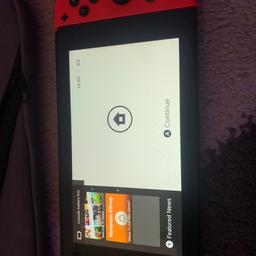 Nintendo switch fully working, has no scratches on the screen comes with original charger two steering wheels, case and everything in the pic. No games and no box

Collection only