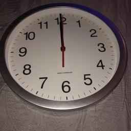New without box. Argos silver radio controlled wall clock