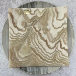 Decorative Onyx plate

£25

Onyx is a cryptocrystalline form of Quartz. The colours of its bands range from white to near every color. Usually, versions of onyx available contain bands of colors of white, brown and tan.