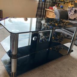 Perfect condition large black glass tv stand,no marks like new.FREE as we just bought a new one and want a good home for it,it’s 1 metre wide and 500 mm high