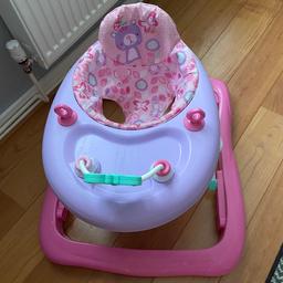 Pink baby Walker
Barely used
In excellent condition 
Folds down and removable seat cover to wash easily
Collection only