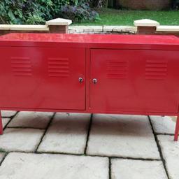 Red, metal IKEA PS cabinet with key. Has removable shelves inside so you can store large or small items. Couple scratches but nothing serious. No offers please. Thanks 