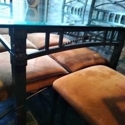 Glass/metal table and 6 X chairs. Chairs have been quickly upholstered by myself (as shown in pic) original seat covers are cream and will need a good clean to bring back to original state thanks to messy little fingers. Has a few scratches here and there.
