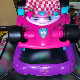 Very nice pink checked racing car walker. 
From a smoke and pet free home
Collection from hall green
Can deliver locally for fuel cost.