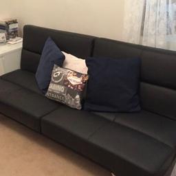 Black faux leather click clack sofa bed with chrome legs, in good condition, no rips or tears. Selling as we need the space after Xmas! Can deliver locally for fuel money or collection welcome. thanks for looking