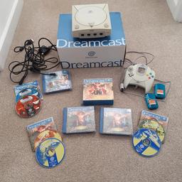 Sega Dreamcast 
1 controller 
2 memory cards 
Skies of Arcadia boxed with instructions 
Shenmue 2 boxed with instructions 

All in working order.