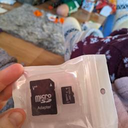 micro SD card and adapter. brand new. open to offers