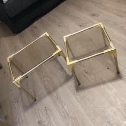 Glass tables with a gold finish