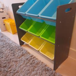 Grey wooden childrens toy storage unit with 9 plastic storage boxes. Practically brand new as brought it and realised it was too small for us. Can be dismantled if required, collection only from Penge SE20.