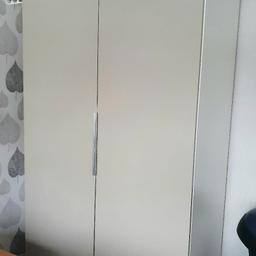 Ikea pax wardrobe 2 doors
inside hanging rail.
Doors are a kind of putty colour
Frame is white
Measurements:
200 cm high
100 cm wide
60cm deep
Really great condition but one side has a couple of small screw holes in where I hung my bags.
since listing we have moved it to another room and found some more small screw holes on the same side as the bag hooks.
they will not be noticed if against a wall on left side like in photo. or they could be filled
Can be dismantled for transportation.