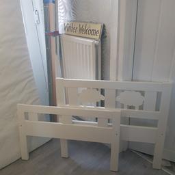 white wooden toddler bed with detailed lamb cut outs ..comes complete with mattress .. like new, collection from huyton L36