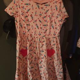 such a cute dress, worn once or twice, but still like new. Heart pockets on the front and heart shaped cut out on the back
size 20
offers welcome