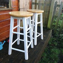 Used stools in good condition. One has paint marks which I will remove prior to selling. Each stool has a screw cap cover missing as shown in photos.